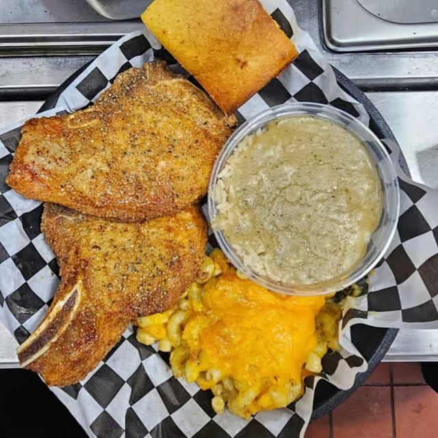 2pc Deluxe Pork Chop & 2 Sides.